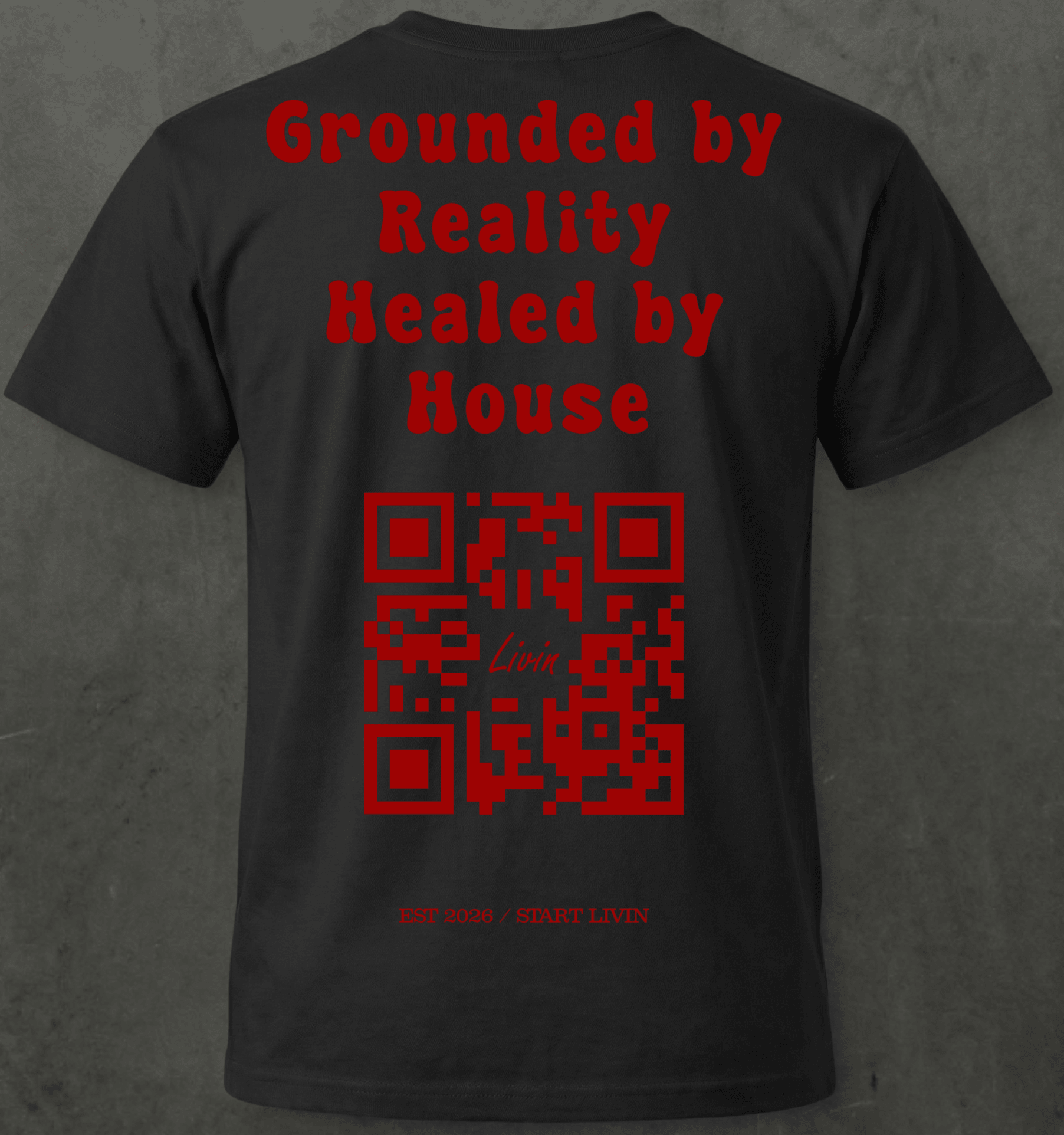 Grounded by Reality Healed by House Tee — LIVIN black cotton t-shirt, back print view